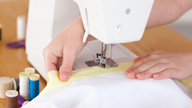 PHOTO: WAVEBREAKMEDIA 3637139-caucasian-hands-using-a-sewing-machine-in-the-living-room
