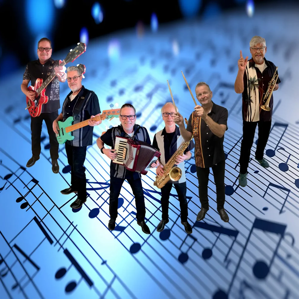 Bild på bandmedlemmar som håller i instrument