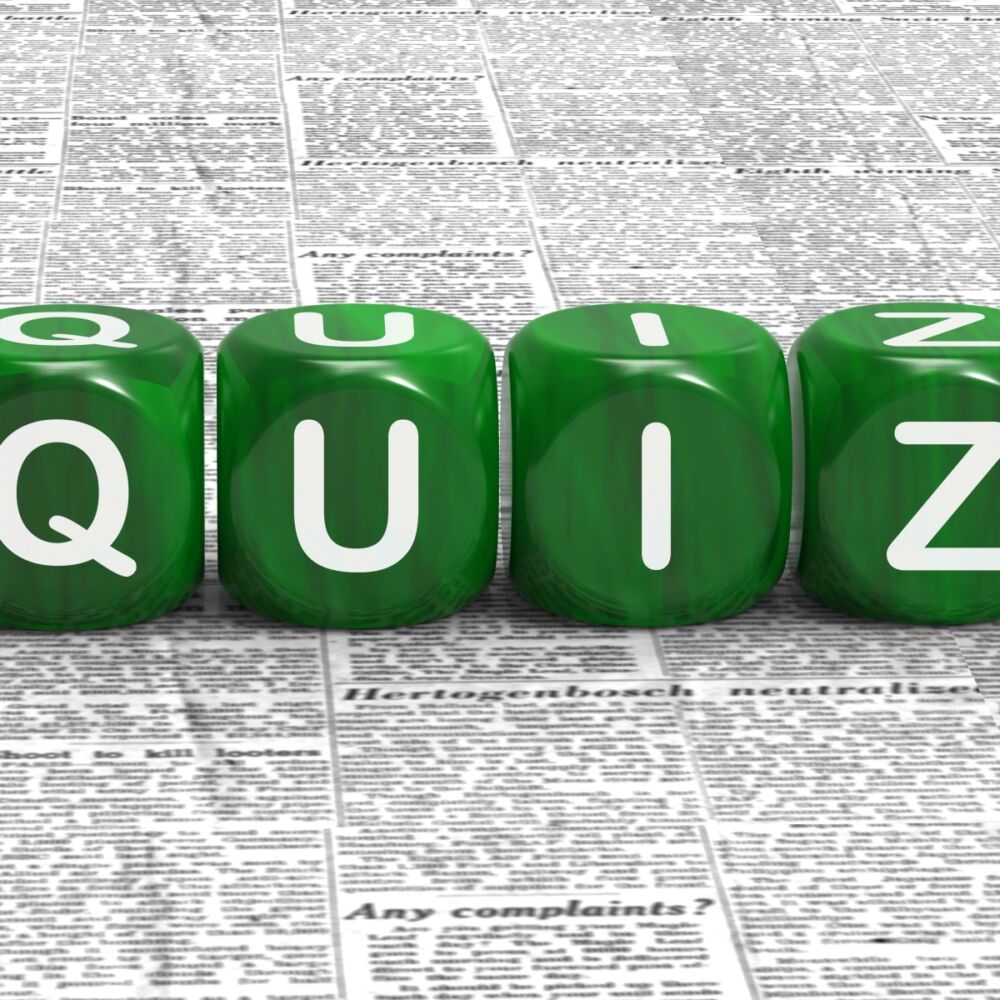 Tärningar med bokstäver som bildar ordet Quiz