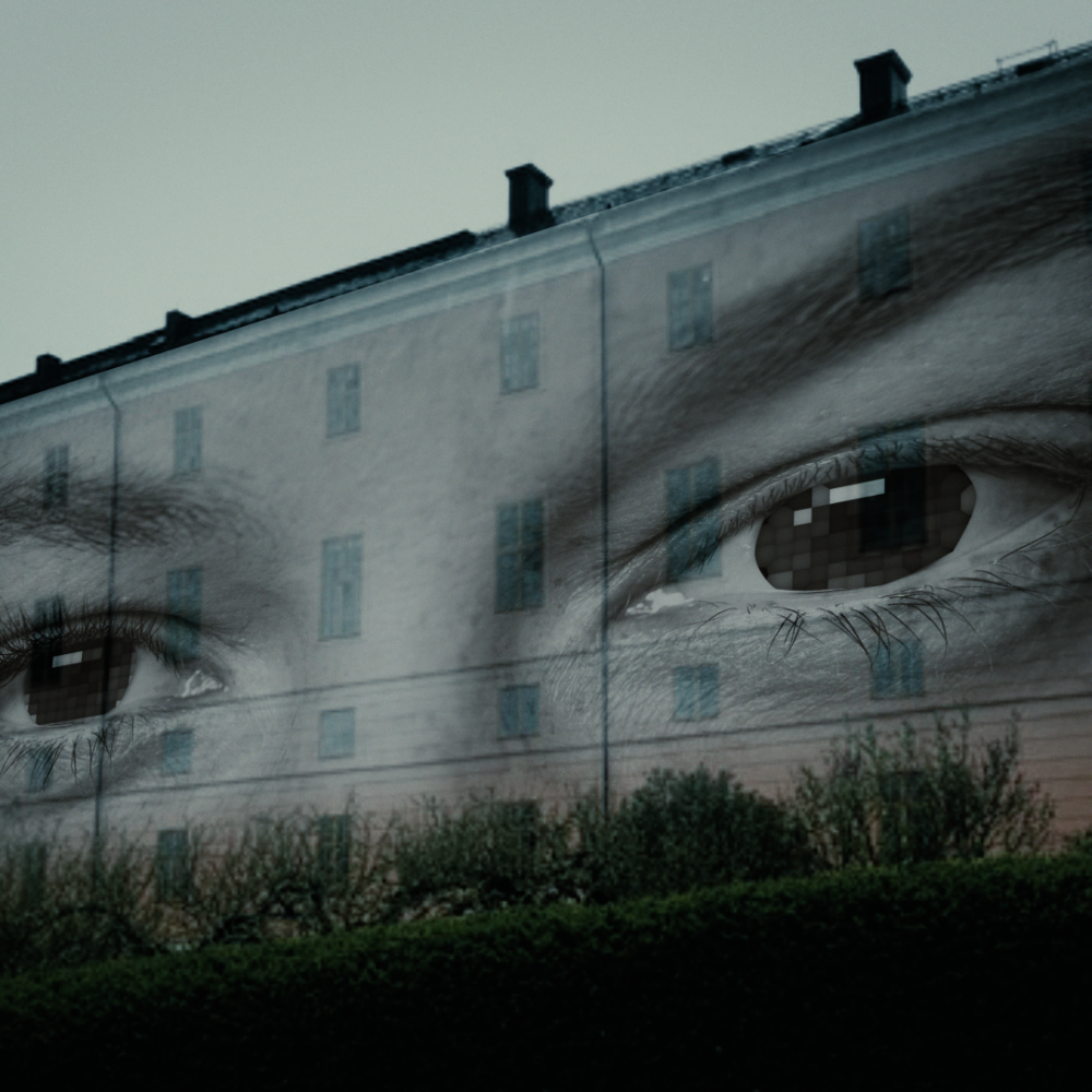 video med stora ögon som visas på väggen