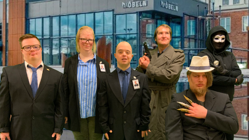 en grupp människor stor framför kulturhuset