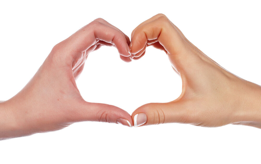 Händer formade som ett hjärta