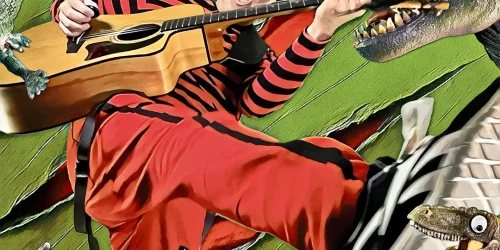 Bild på en man med gitarr. Han kallar sig Pappa kapsyl